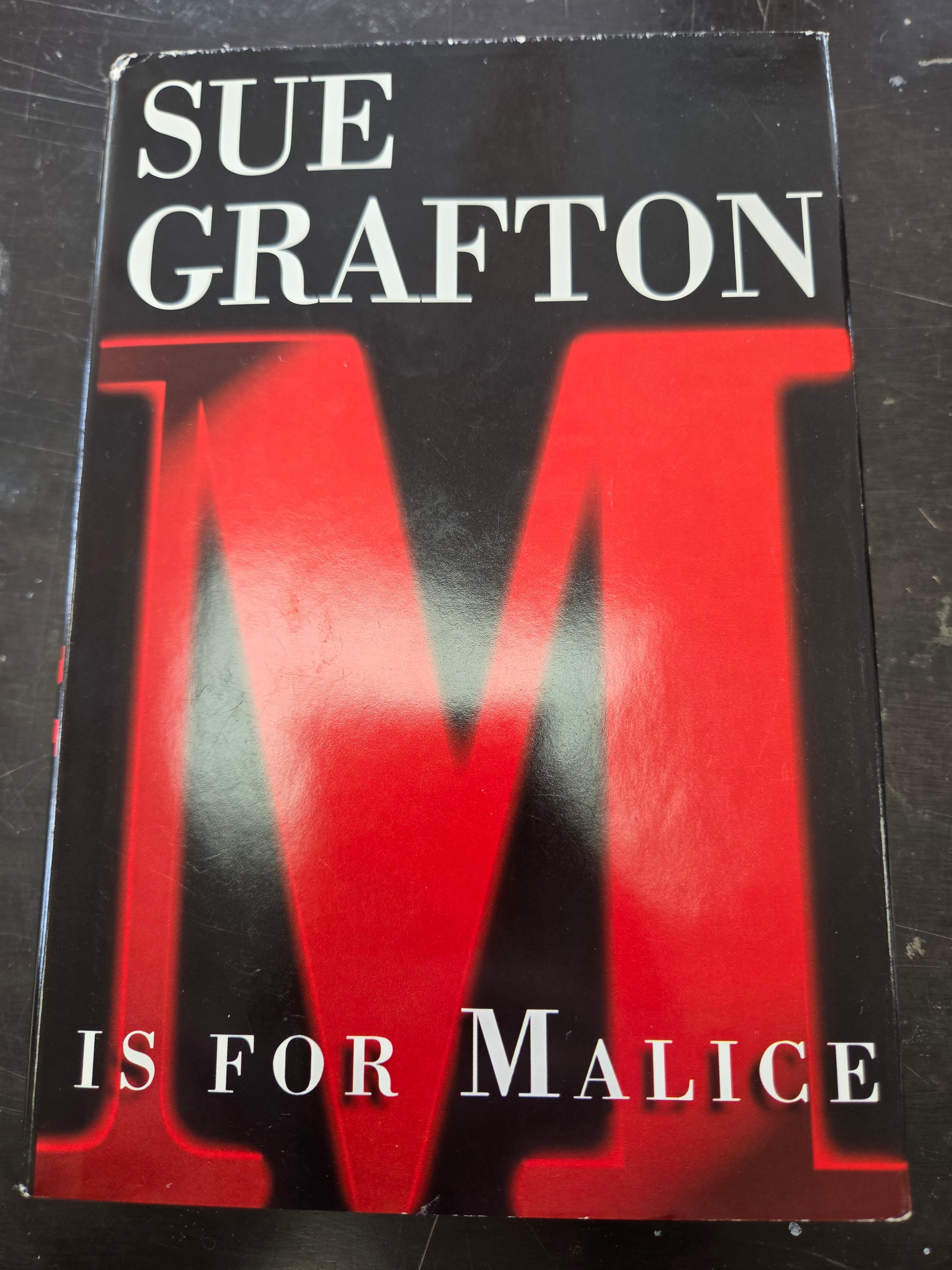 M is For Malice: Alphabet Mystery Series book 13th by Sue Grafton (Hardcover) (Used)